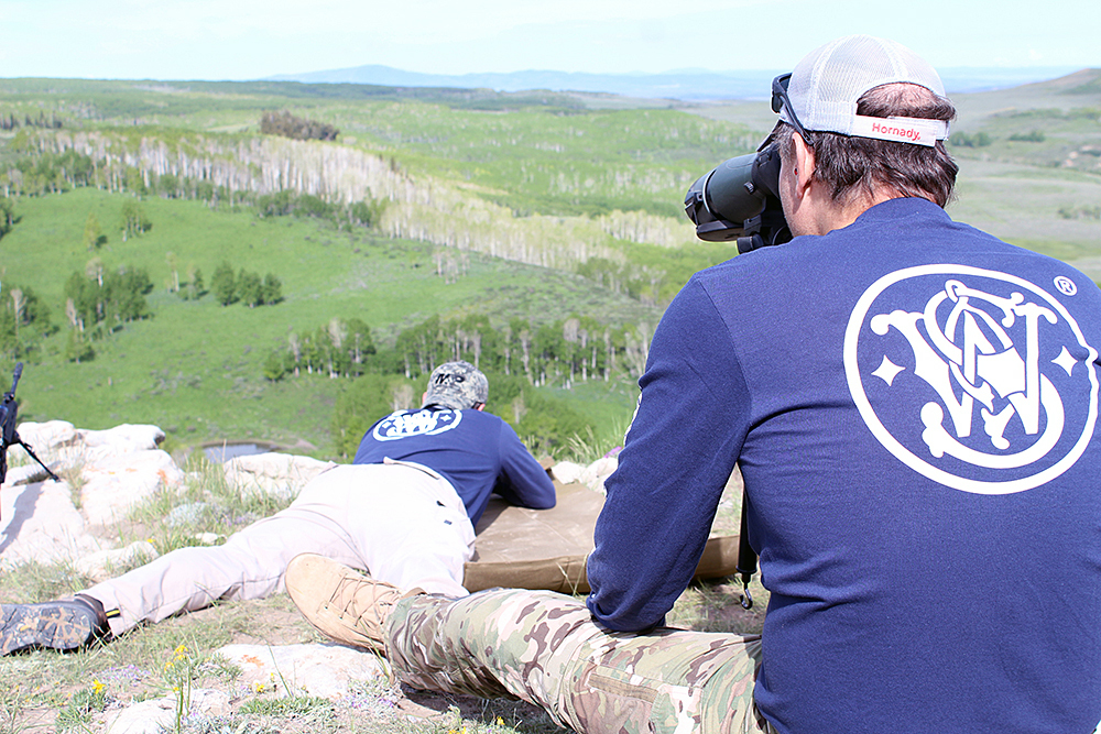 Spotter/shooter communication was even more important in field conditions. We noticed that while there was a stiff breeze coming from the right at our shooting positions, down at the target, the spotting scopes told us the air was still. "Center hold, send it!"