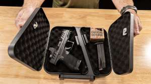 Hornady Security Dual Lid Lock Box with pistol ammo and magazine