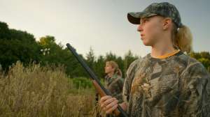 Girl dove hunting shotgun