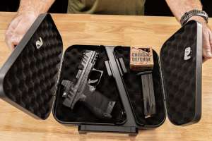 Hornady Security Dual Lid Lock Box with pistol ammo and magazine