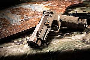 Sig Sauer M17 military surplus handguns e991f65cda8cad0d03a7ea8cd2674507