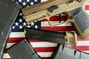 Sig Sauer M18 with magazines American flag photo by Clemons
