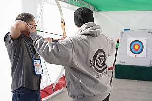 Shooting bow at SHOT Show